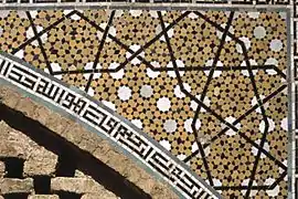 Girih tiles: patterns at large and small scales on a spandrel from the Darb-i Imam shrine, Isfahan, 1453