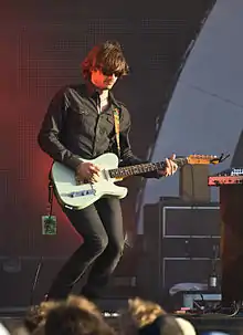 Middleton on guitar with Powderfinger in January 2010 at Big Day Out, Melbourne