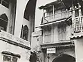 An Iconic gate called "Darwaza" of Badri Mohalla which was demolished to give a way for the construction of new mosque - 1389 AH/1969 AD