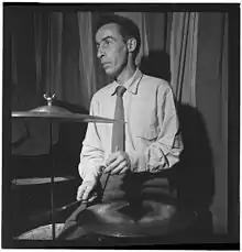 Dave Tough in Eddie Condon's basement, c. 1947Photography by William P. Gottlieb