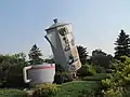 Coffee pot monument in Davidson, Saskatchewan. Approximately 24 feet tall, and would hold 150,000 cups of coffee - claimed to be the world's largest.Erected in 1996, and featured on a Canadian postage stamp in 2010, the town is now considering renovation of the monument.