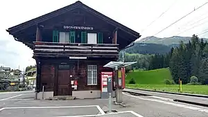 Two-story building with gabled roof