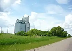 Former Saskatchewan Wheat Pool grain elevator along Railway Street, Delmas.