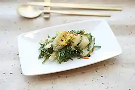 Deodeok-yuja-salad, a lance asiabell root salad with yuja-cheong-based dressings