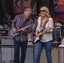 Trucks (left) and Tedeschi on stage in Shelburne, Vermont, June 2014