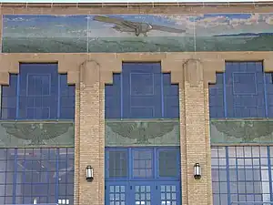 Bas-relief of the Spirit of St. Louis crossing the Atlantic above entrance