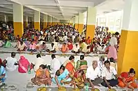 Devotees having Prasad in Anandabazar