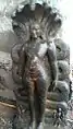 Tirthankara Parshvanatha of Jainism standing under Naga hood