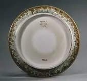 Back of previous dish, with marks