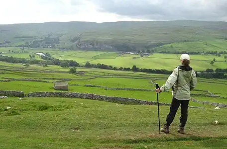 Kilnsey Crag above River Wharfe, across Wharfedale