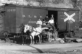 Freight car at a grade crossing, 1900