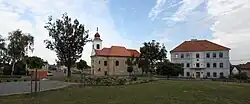 Centre of Dolní Slivno with the Church of Saint Francis of Assisi and municipal office