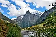 View of the mountain from the gorge from the side of Dombay