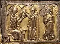 Lower left hand panel with scribe handing a book shrine to a cleric