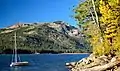 Boat's mast pointed at reddish Mount Judah.Donner Peak centered, from Donner Lake