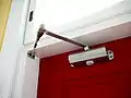 Door closer mechanism.