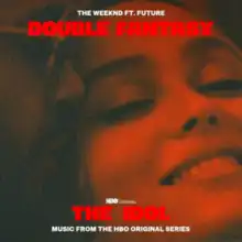 Cover art for "Double Fantasy": a photo of Jocelyn and Tedros, the Weeknd's character in The Idol, in a red filter