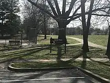 a park with tennis courts and soccer field