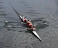 A Women's Coxed Four from Tees rowing club racing