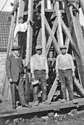 Hendrik Schraa (far left) during steeple construction in 1932