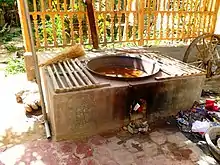 Dye in pan on stove. Khotan