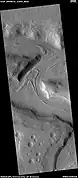 Glaciers moving in two different valleys, as seen by HiRISE under HiWish program Location is Ismenius Lacus quadrangle.