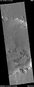 Wide view of layers in crater, as seen by HiRISE under HiWish program