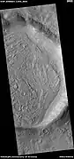 Crater showing how thick mantle is in place, as seen by HiRISE under the HiWish program