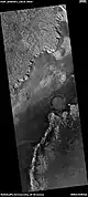 Wide view of light-toned surfaces, as seen by HiRISE under HiWish program