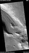 Valley showing Lineated valley fill, as seen by HiRISE under HiWish program  Linear valley flow is caused by ice movements.