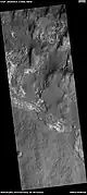 Wide view of light and dark toned layers, as seen by HiRISE under HiWish program