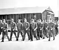 Flight Cadets marching to a ground class.