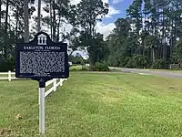 A color photograph of the front of the plaque at Earleton, Florida