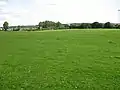 The main grassed area, with sports pitches in the distance