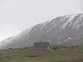 House in Easter Quarff, with Scrae Field behind