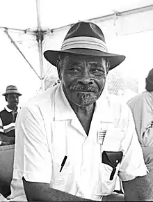 Blues singer Eddie Cusic relaxing at the Smithsonian Folklife Festival, 1991.