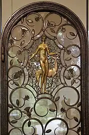 The foliage scroll – Elevator doors, by Brandt (1926), wrought iron, glass, patinated and gilded bronze, Calouste Gulbenkian Museum, Lisbon