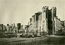 The castle, pictured in 1893 during the restoration work. The buildings around the castle have been demolished.