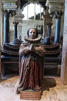 At the head of her parents' memorial in St Katharine's Chapel