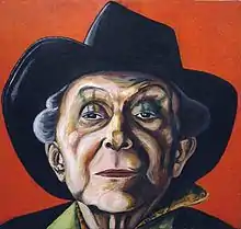 This colorful portrait focuses on Crisp's face (under his trademark fedora), but the viewer can still glimpse a stylish shirt collar. Crisp squints down his nose at the viewer through almond-shaped eyes. Green stripes extend from eyelid to eyebrow.