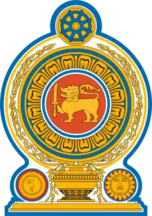 The Emblem of Sri Lanka, featuring a blue dharmachakra as the crest