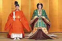 Image 30Newly-wed Emperor Naruhito, then Crown Prince, wearing a sokutai and Empress Masako, then-Crown Princess, wearing a jūnihitoe. Costumes of these styles have been worn by the Imperial family since the Heian period, when a unique Japanese style developed. (from Culture of Japan)