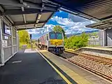 The modern day Enterprise train departs Newry towards Dublin Connolly, pushed by loco 207