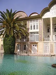 Ornamental pool and date palm at Eram Garden