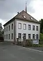 The parish house belonging to the church used to be the primary school in the village