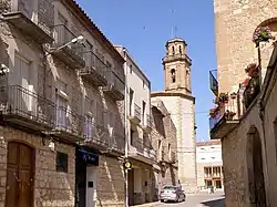 Carrer de Maials, with the church of the Assumption