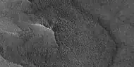 Close-up of East side (right side) of previous image of pedestal crater showing polygons on lobe.  Since the margin of the crater has lobes and polygons, it is believed there is ice under the protective top.  Picture taken with HiRISE under HiWish program.  Note: this is an enlargement of the previous image.