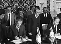 Essebsi and Ahmed Taleb Ibrahimi signing a treaty between Tunisia and Algeria in 1983.