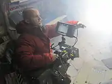 William Eubank operating a camera on the set of "Love"