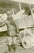 Bullard beside a Caudron trainer